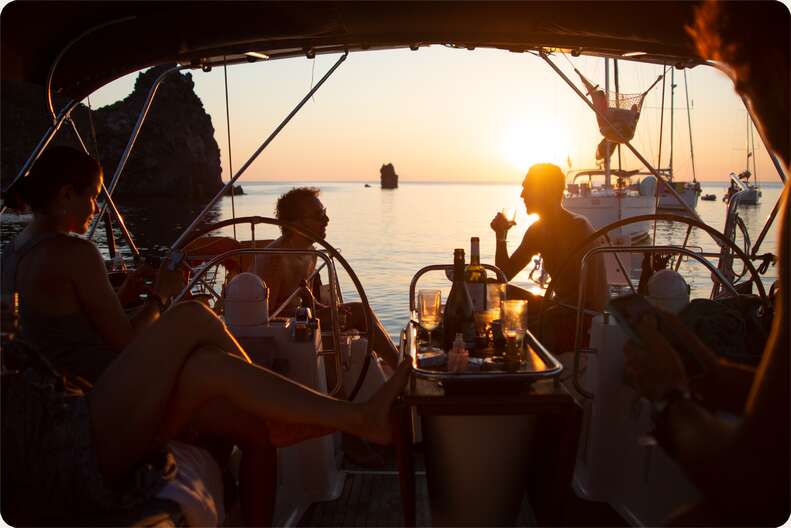 Friends on a boat in Sicily